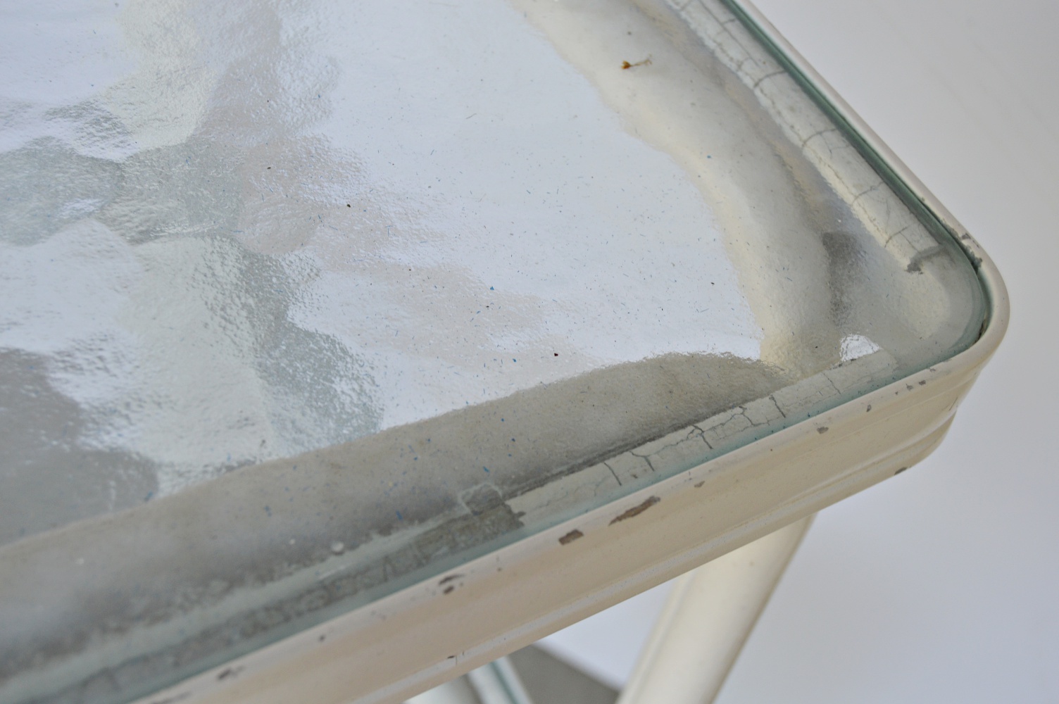 Pair of White Metal and Glass Top Patio Tables and Folding Chair