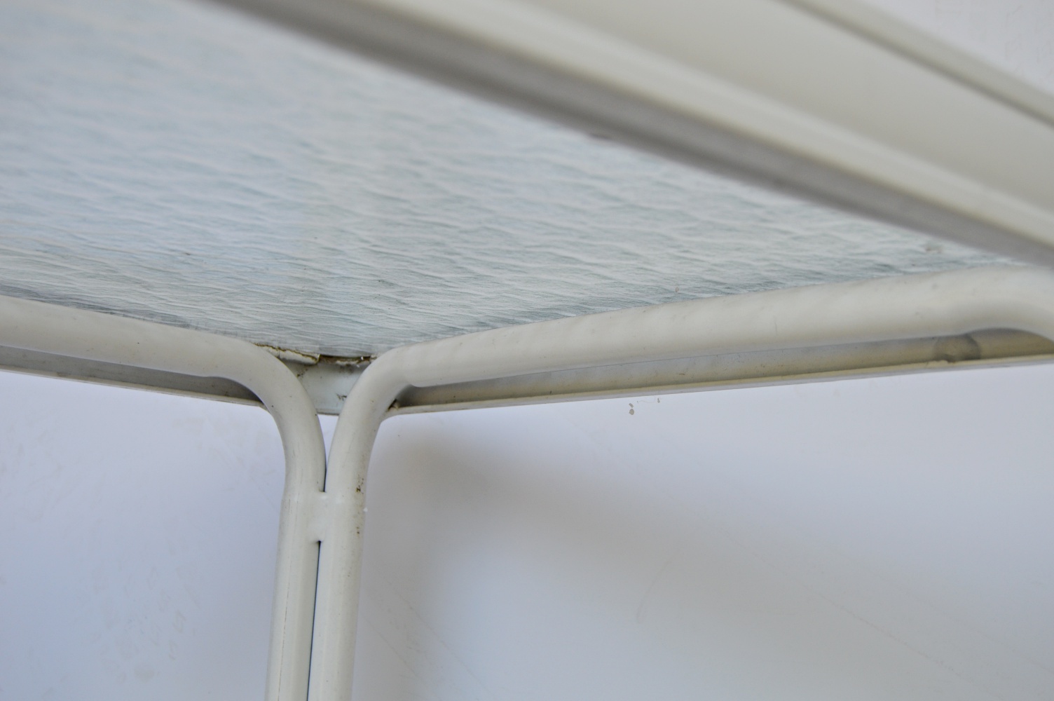 Pair of White Metal and Glass Top Patio Tables and Folding Chair