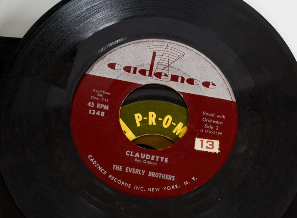 Vintage Rock and Pop 45 rpm Records With Storage Case