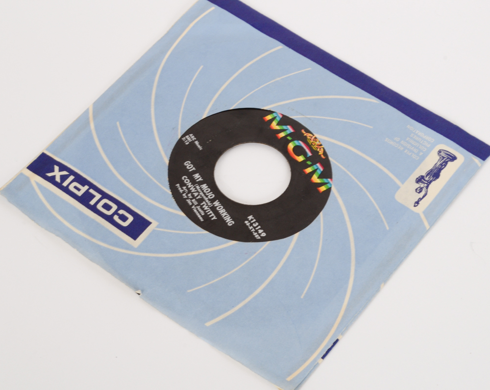 Vintage Rock and Pop 45 rpm Records With Storage Case