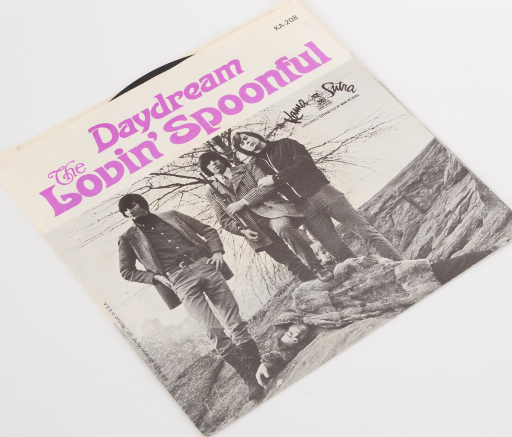 Vintage Rock and Pop 45 rpm Records With Storage Case