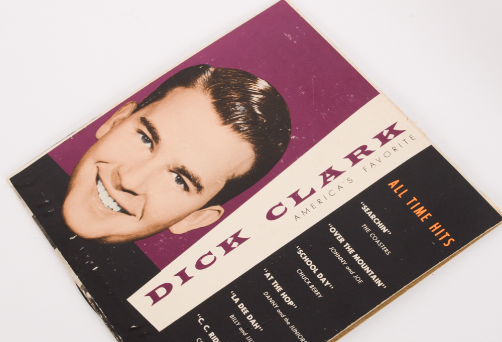 Vintage Rock and Pop 45 rpm Records With Storage Case