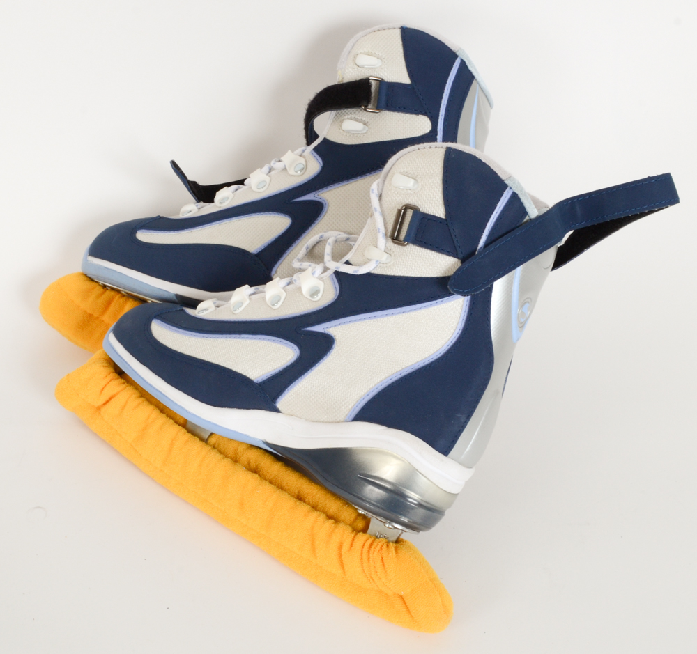 Two Pairs of Women's Figure Skates