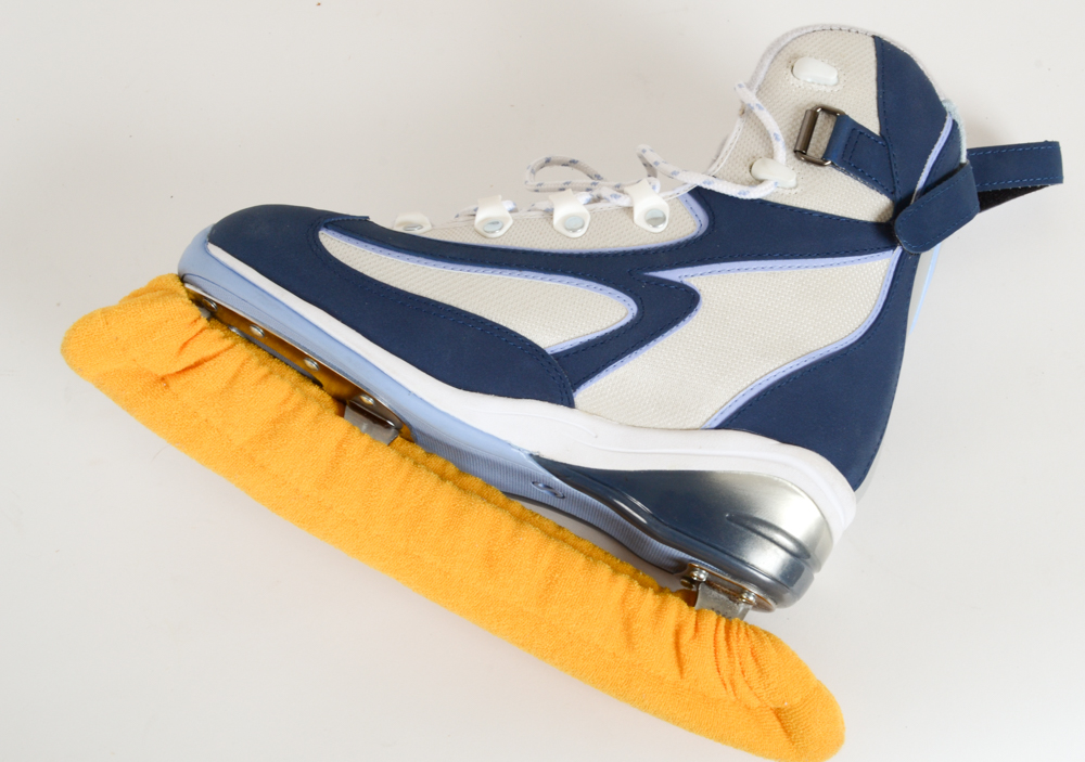 Two Pairs of Women's Figure Skates