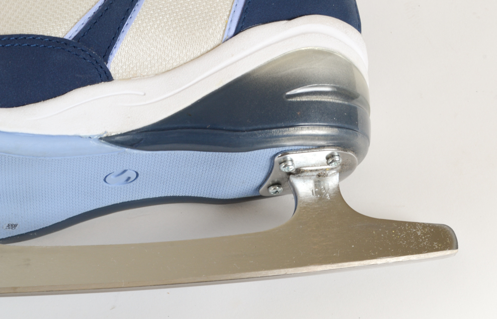 Two Pairs of Women's Figure Skates