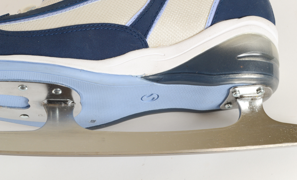 Two Pairs of Women's Figure Skates