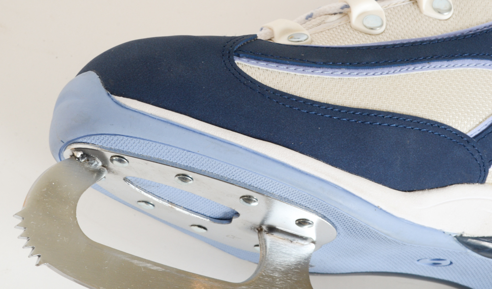 Two Pairs of Women's Figure Skates