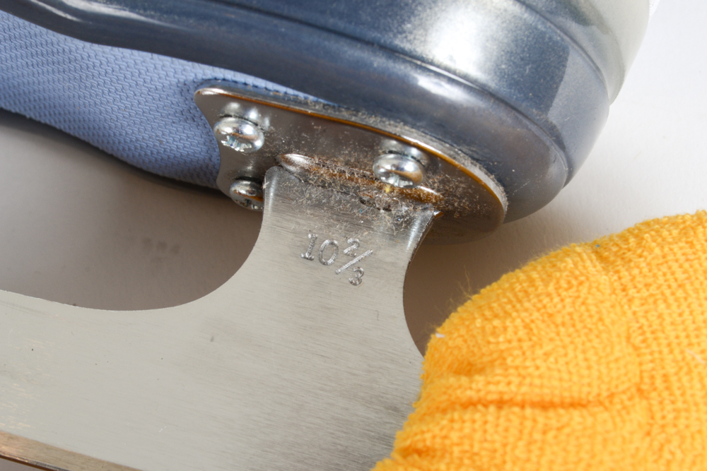 Two Pairs of Women's Figure Skates