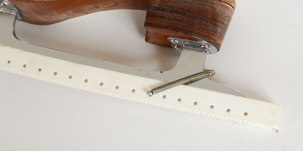 Two Pairs of Women's Figure Skates