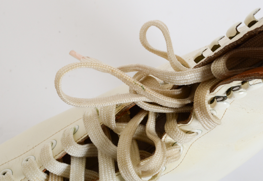 Two Pairs of Women's Figure Skates