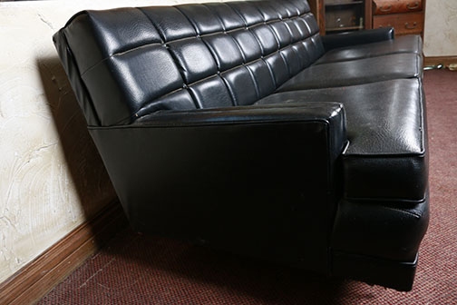 Black Leather Quilted Sofa