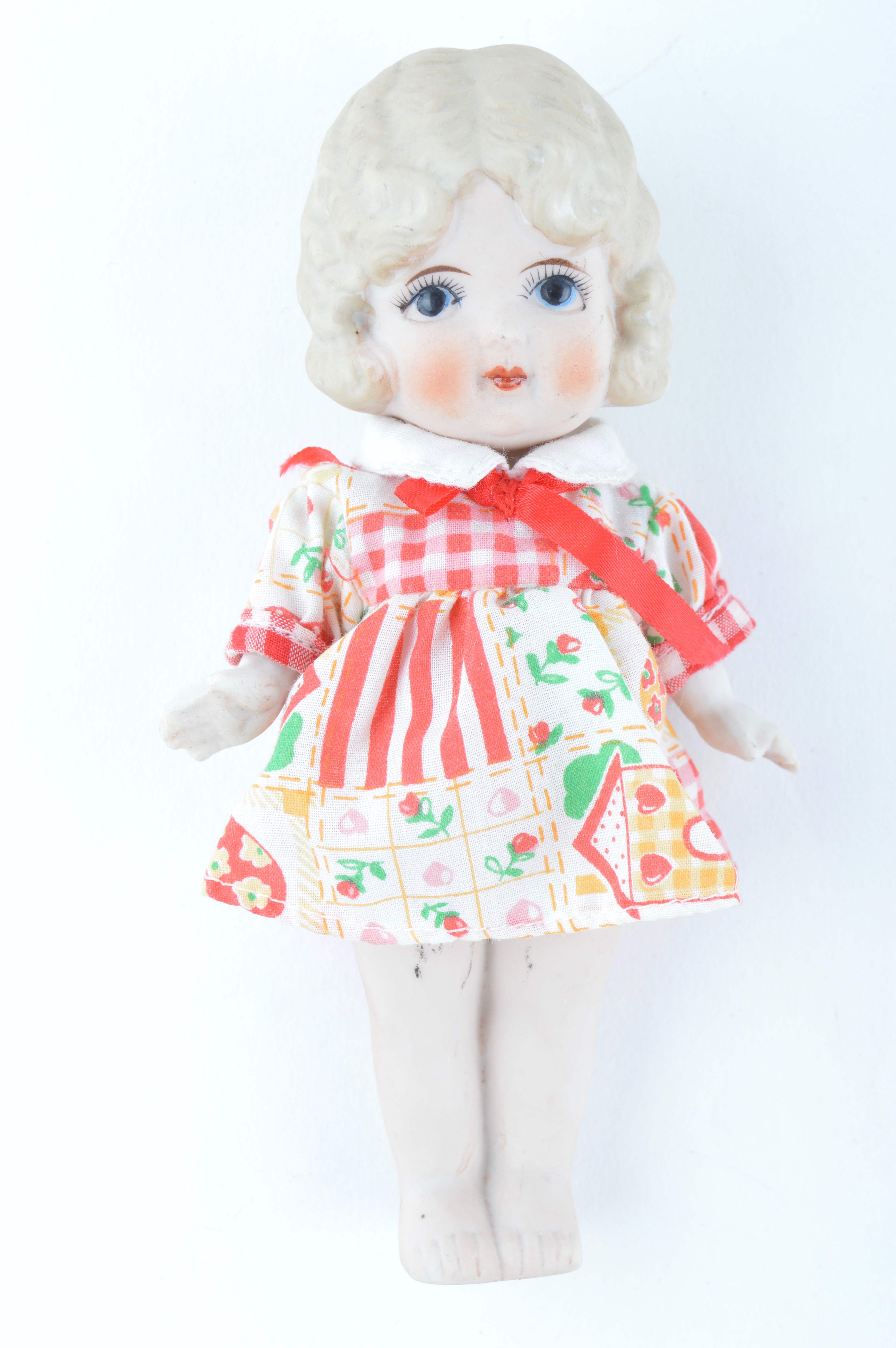 Four Vintage Japanese Bisque Porcelain Dolls with Dresses