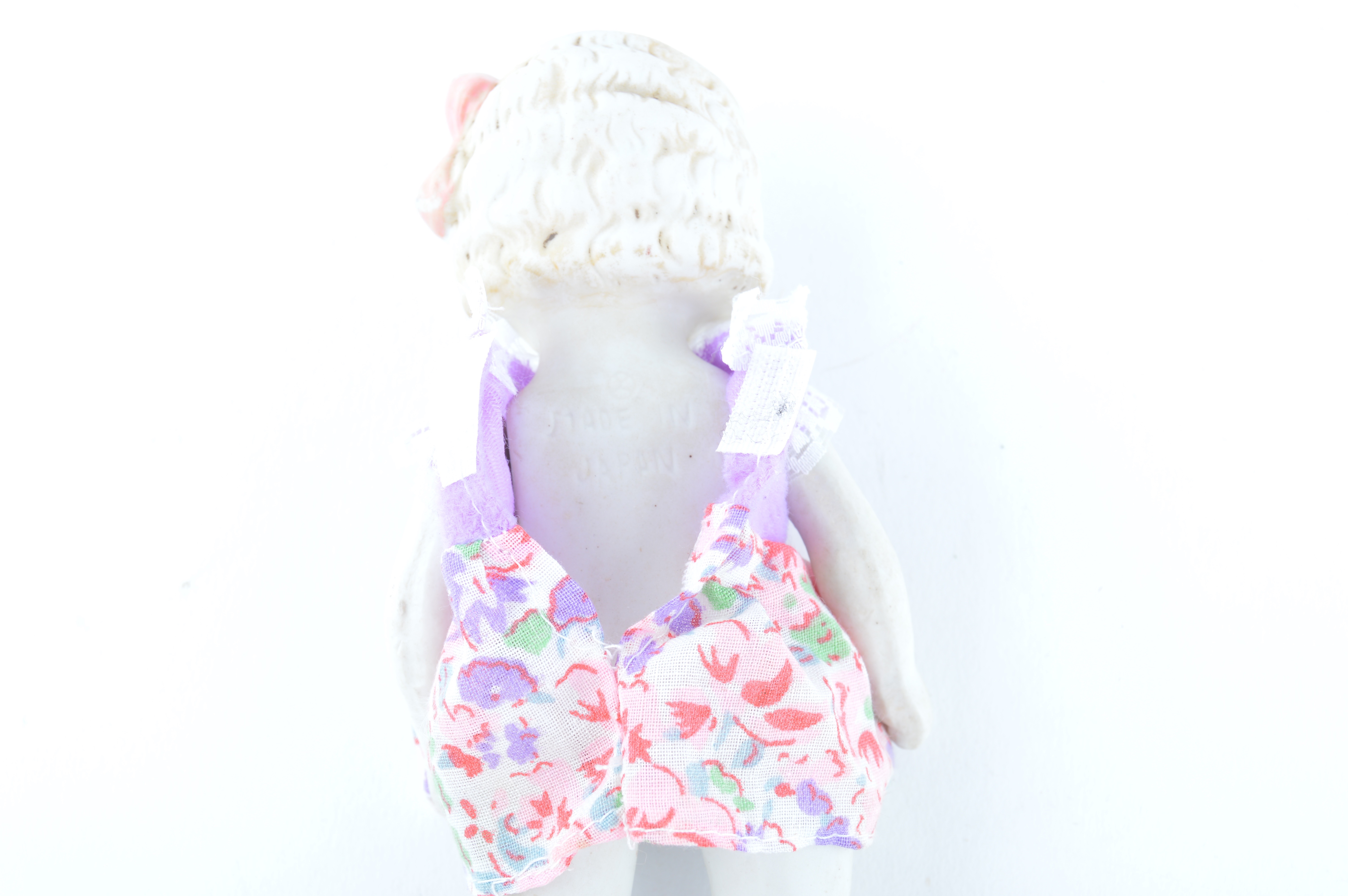 Four Vintage Japanese Bisque Porcelain Dolls with Dresses