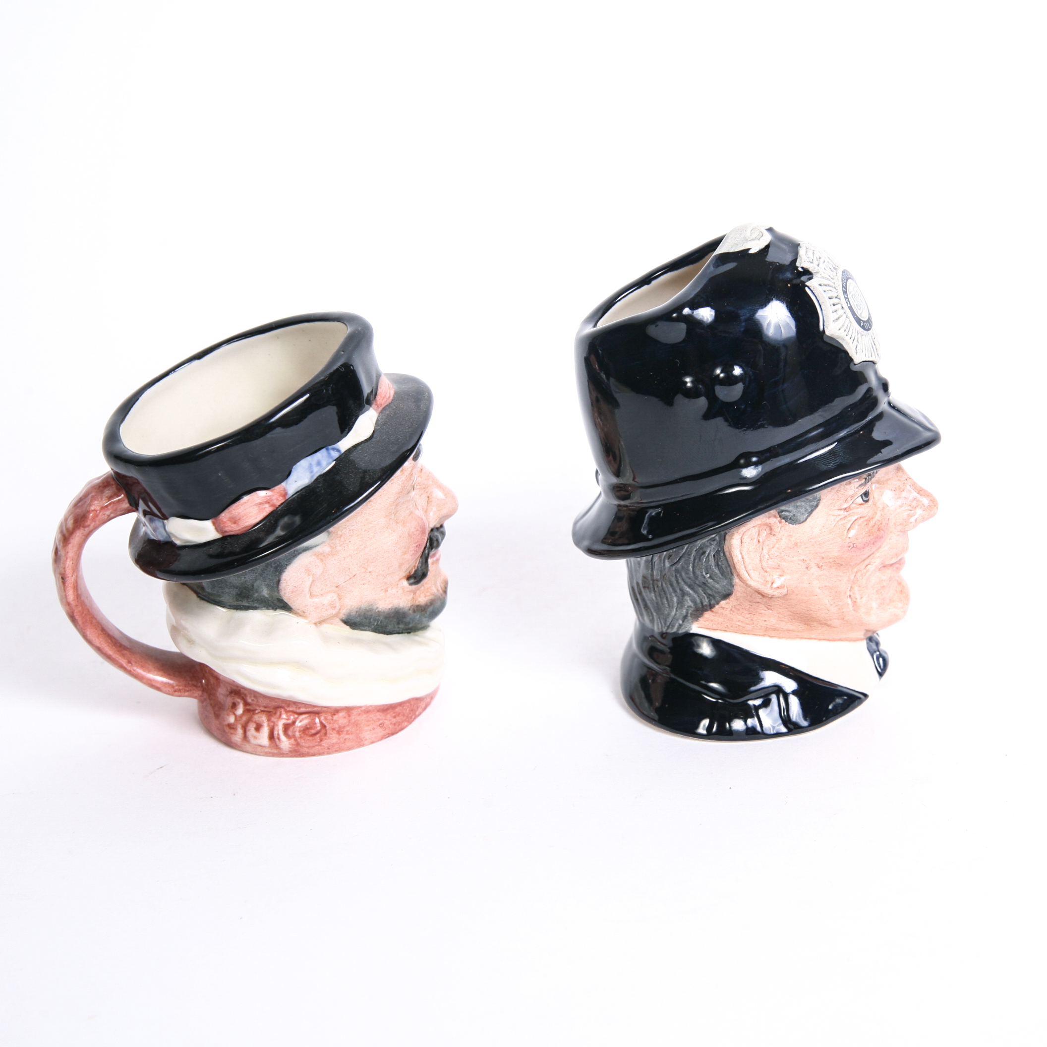 Royal Doulton "Beefeater" D.6233 and "The London 'Bobby'" D.6762 Toby Mugs