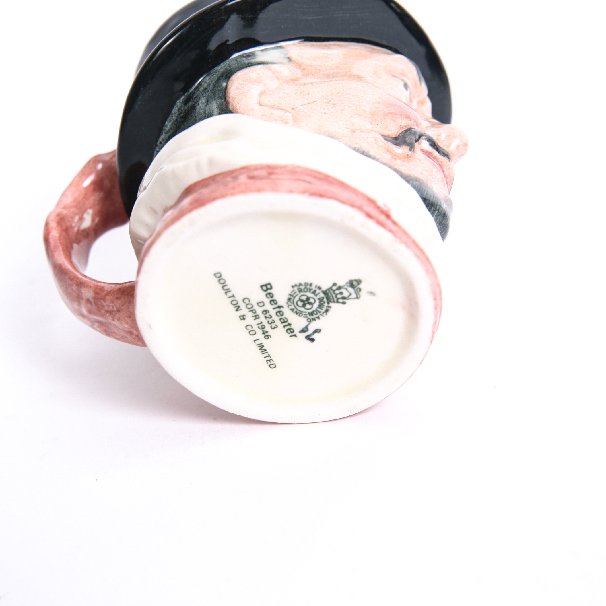 Royal Doulton "Beefeater" D.6233 and "The London 'Bobby'" D.6762 Toby Mugs