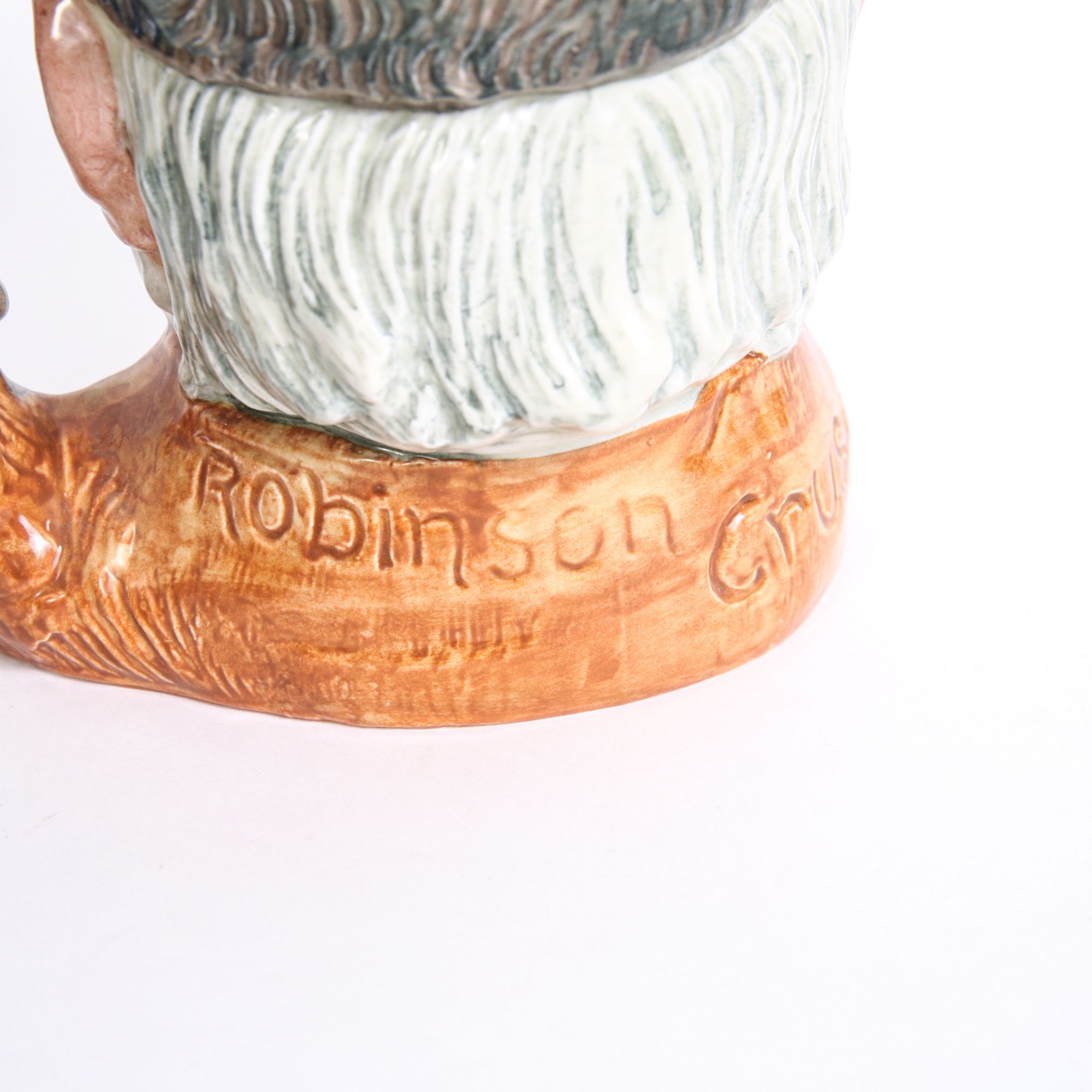 Royal Doulton "Robinson Crusoe" D.6532 Toby Jug and D.6539 Mug