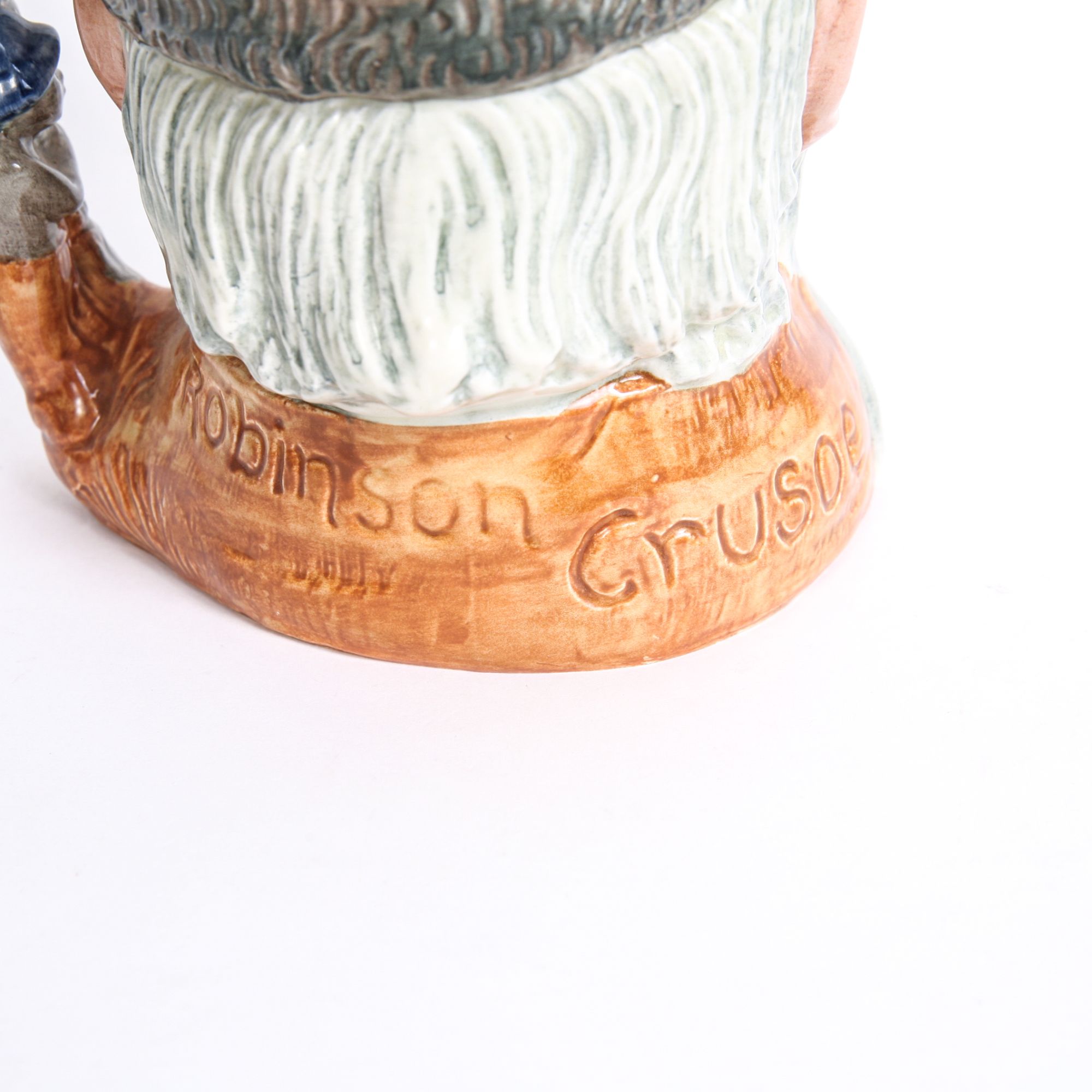 Royal Doulton "Robinson Crusoe" D.6532 Toby Jug and D.6539 Mug