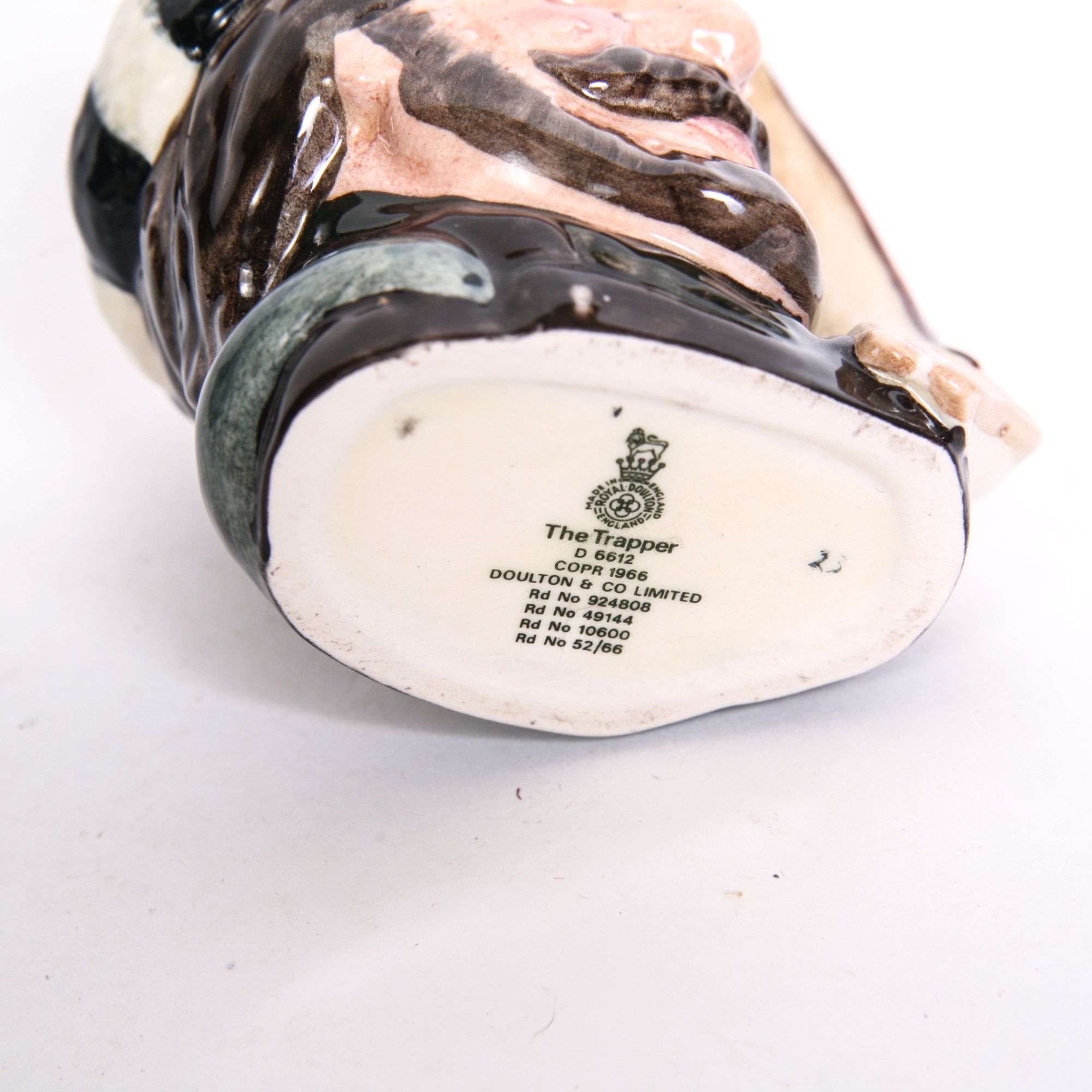 Royal Doulton "The Trapper" D.6609 Toby Jug and D.6612 Mug