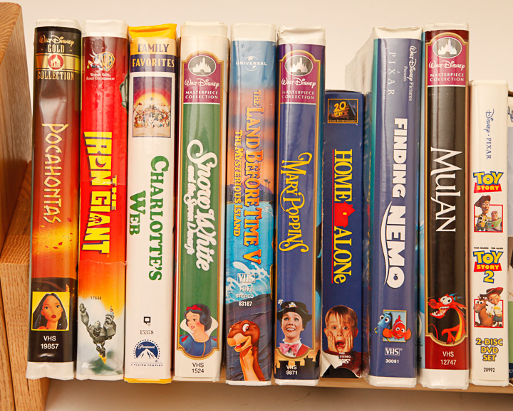 VHS Tapes, DVDs and Wooden Stand