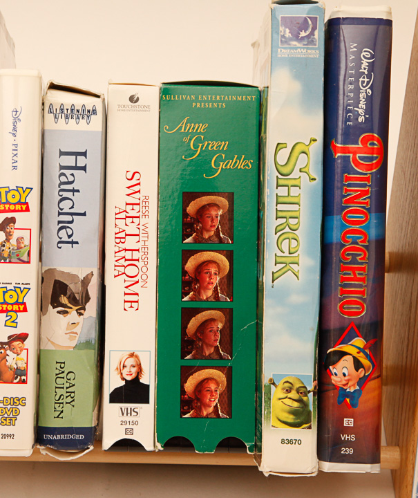 VHS Tapes, DVDs and Wooden Stand