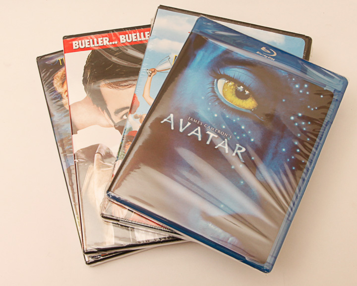 VHS Tapes, DVDs and Wooden Stand