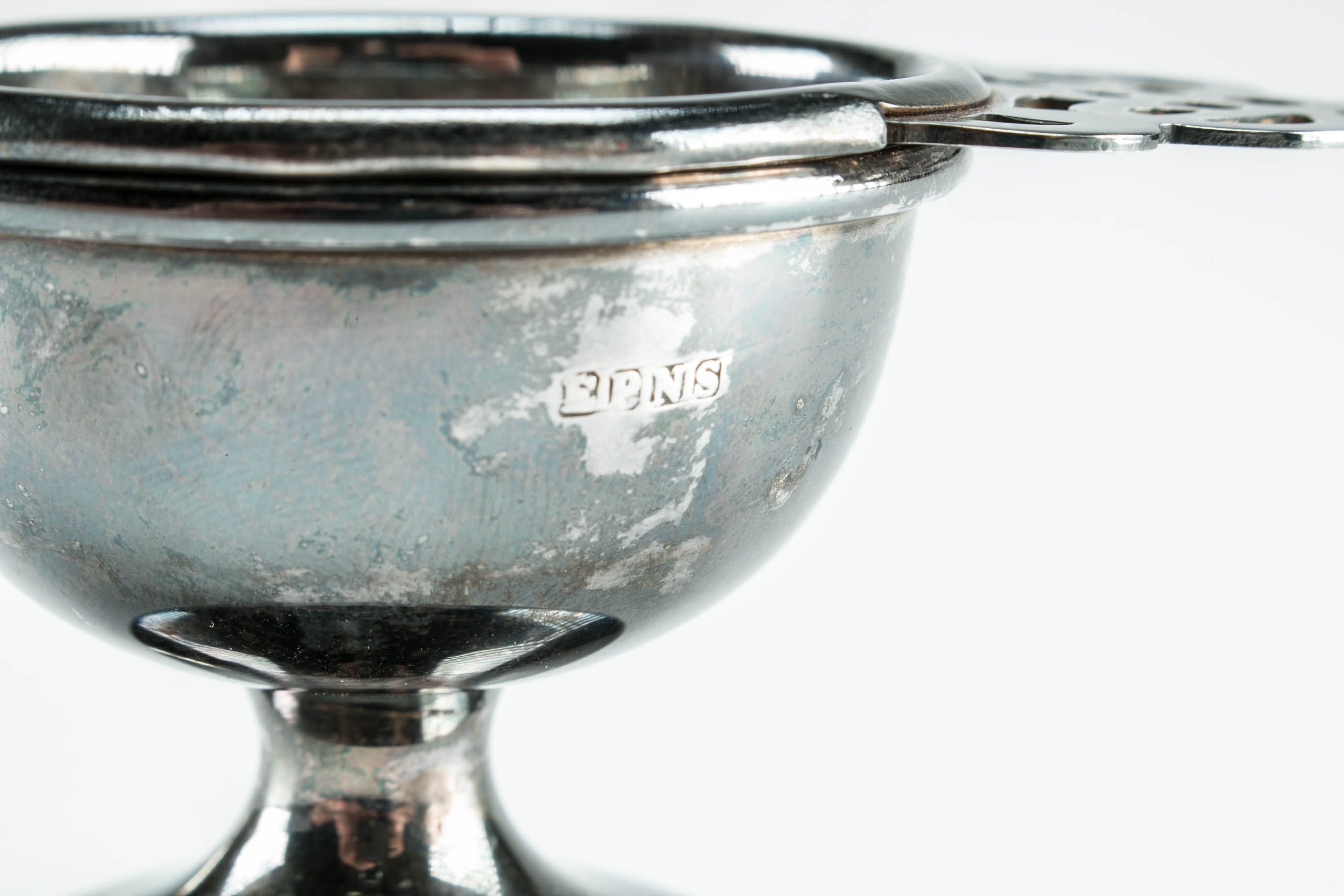 Antique Razor Blade Case, Queen of Hearts Pill Box, Coronation Bank, and Silver Plated Strainer