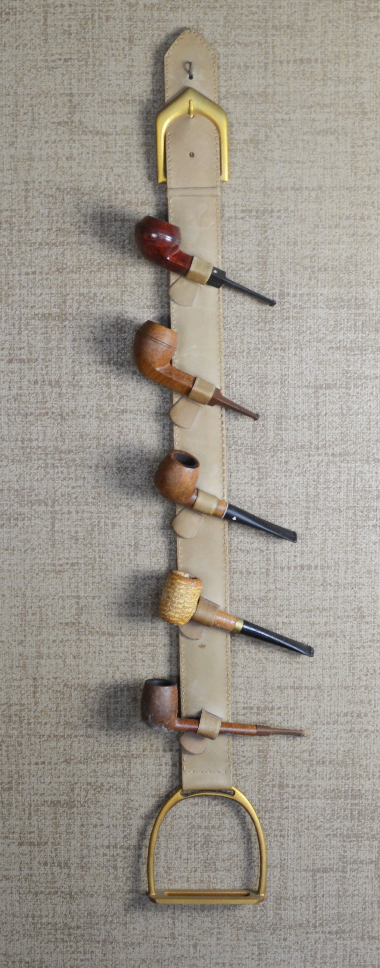 Five Tobacco Pipes On A Stirrup