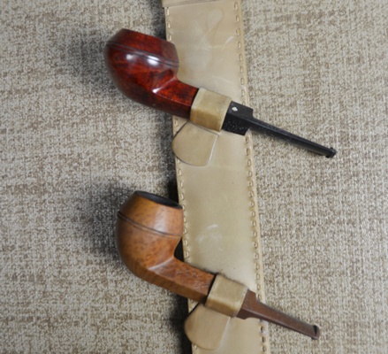 Five Tobacco Pipes On A Stirrup