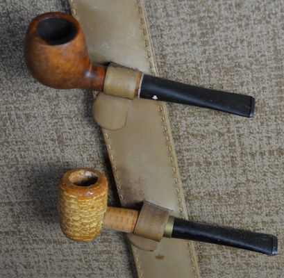 Five Tobacco Pipes On A Stirrup
