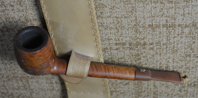 Five Tobacco Pipes On A Stirrup