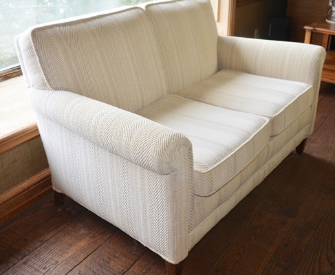 Beige Upholstered Loveseat