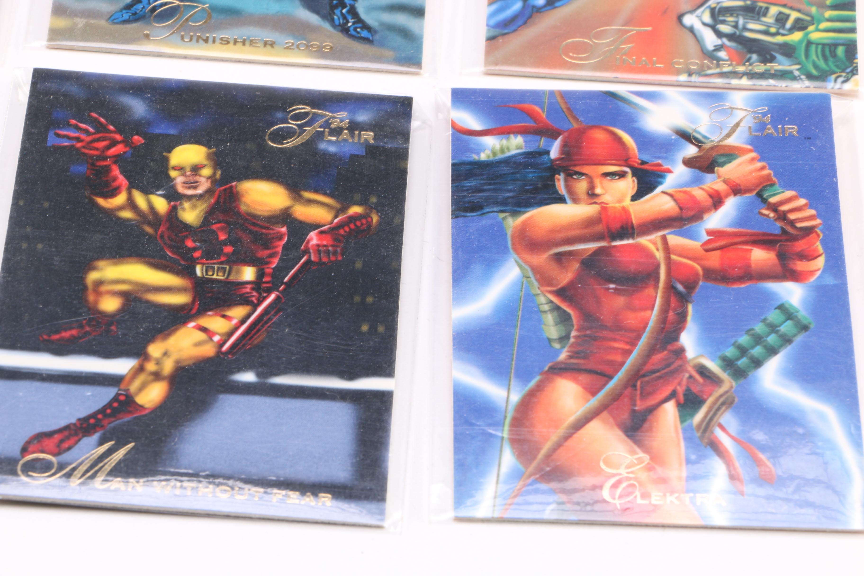 Collection of 1990s Marvel Trading Cards and Pogs