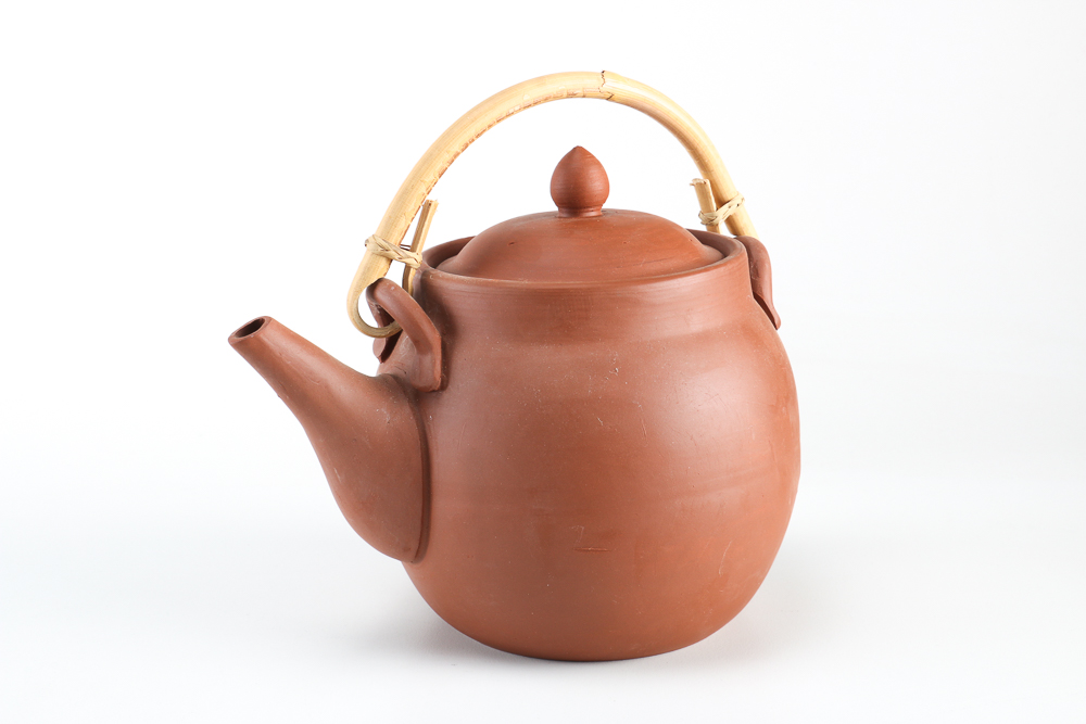 Collection of Stoneware and Porcelain Bowls with a Teapot