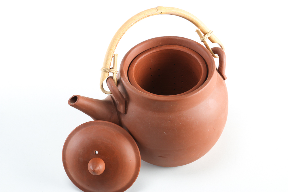 Collection of Stoneware and Porcelain Bowls with a Teapot
