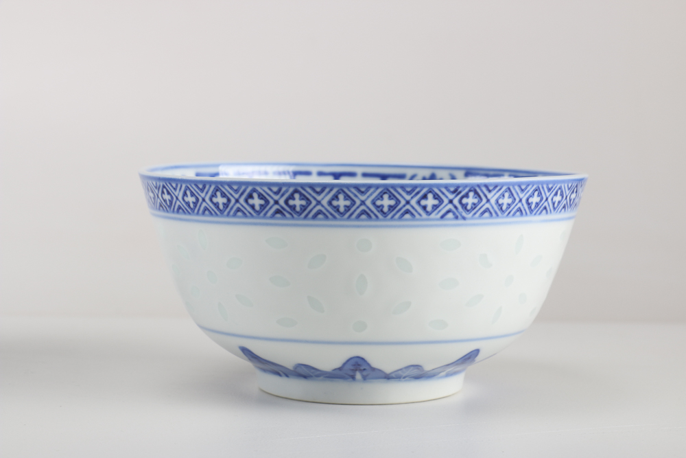 Collection of Stoneware and Porcelain Bowls with a Teapot