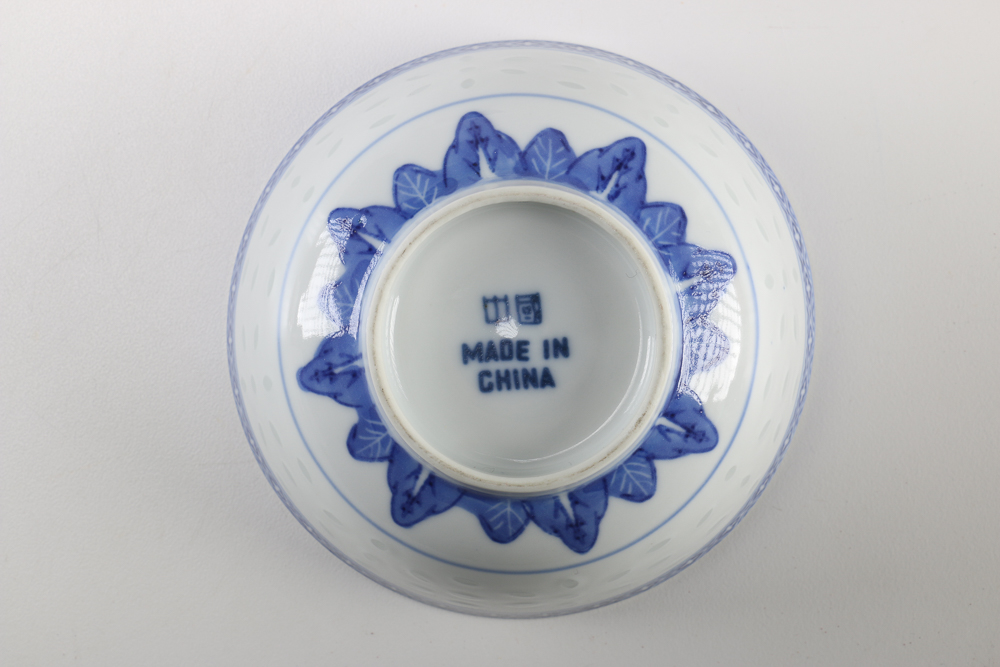 Collection of Stoneware and Porcelain Bowls with a Teapot