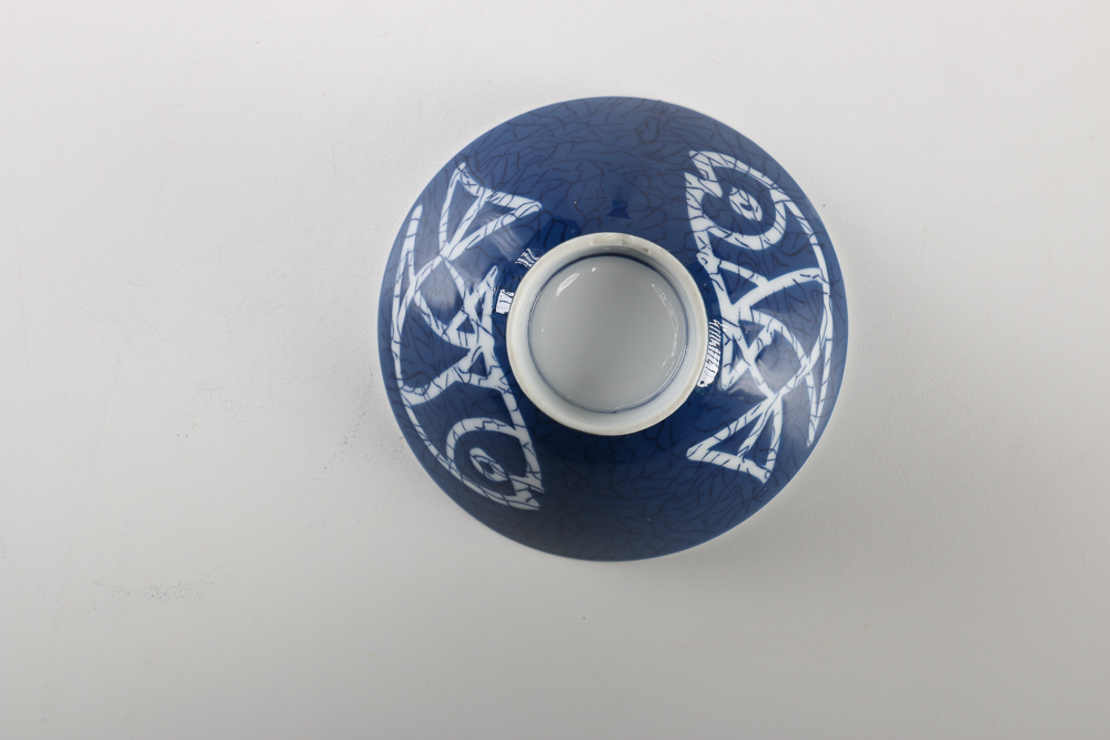 Collection of Stoneware and Porcelain Bowls with a Teapot