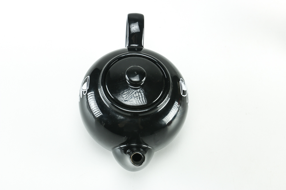 Black Ceramic Teapot and Resin Marine Corps Bear Figurine