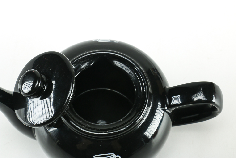 Black Ceramic Teapot and Resin Marine Corps Bear Figurine