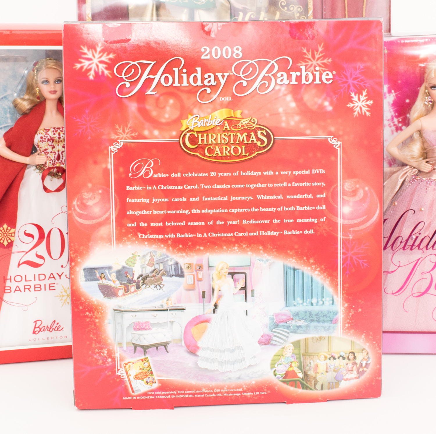 Four Collectible Holiday Barbies in Boxes