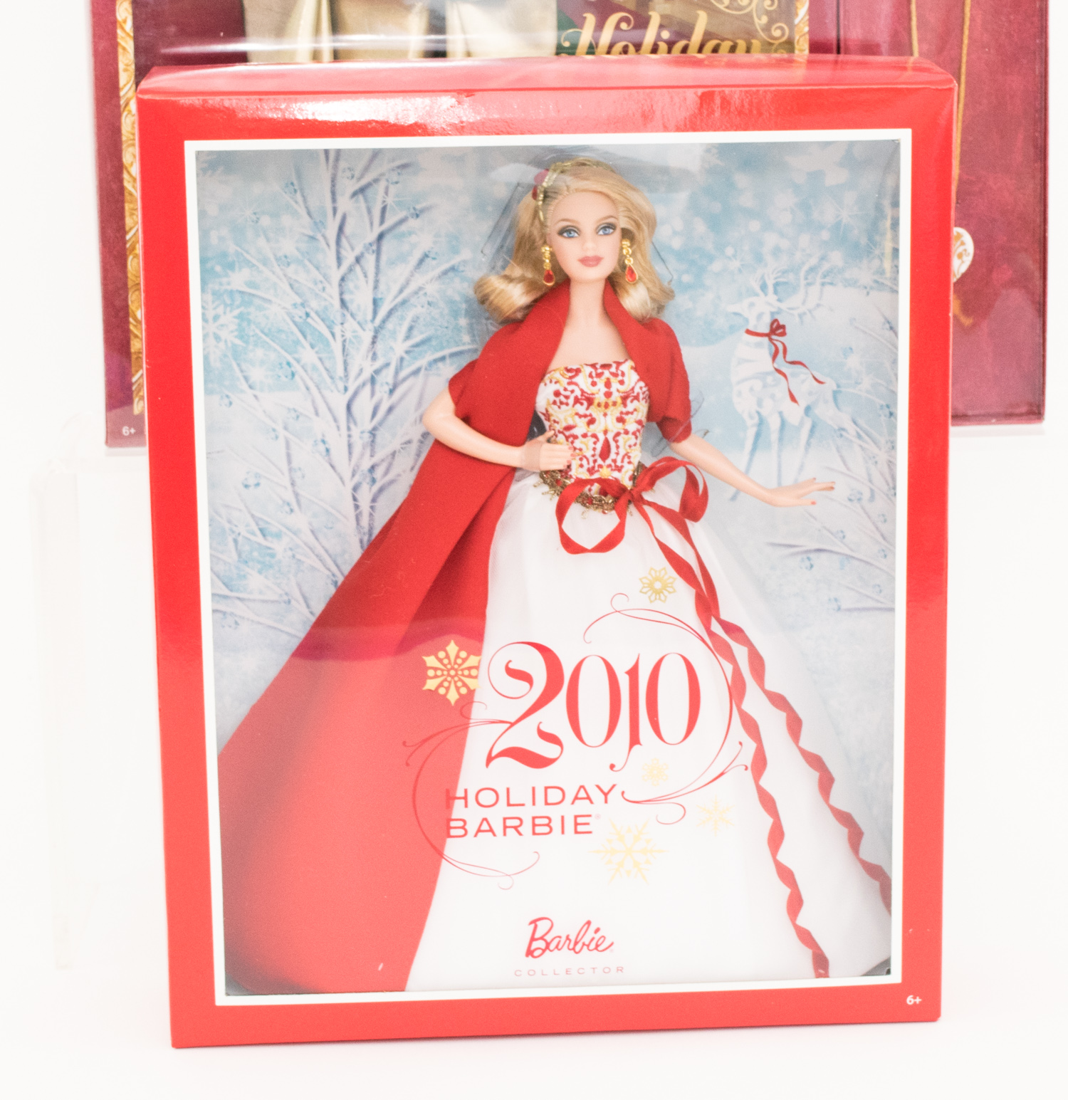 Four Collectible Holiday Barbies in Boxes