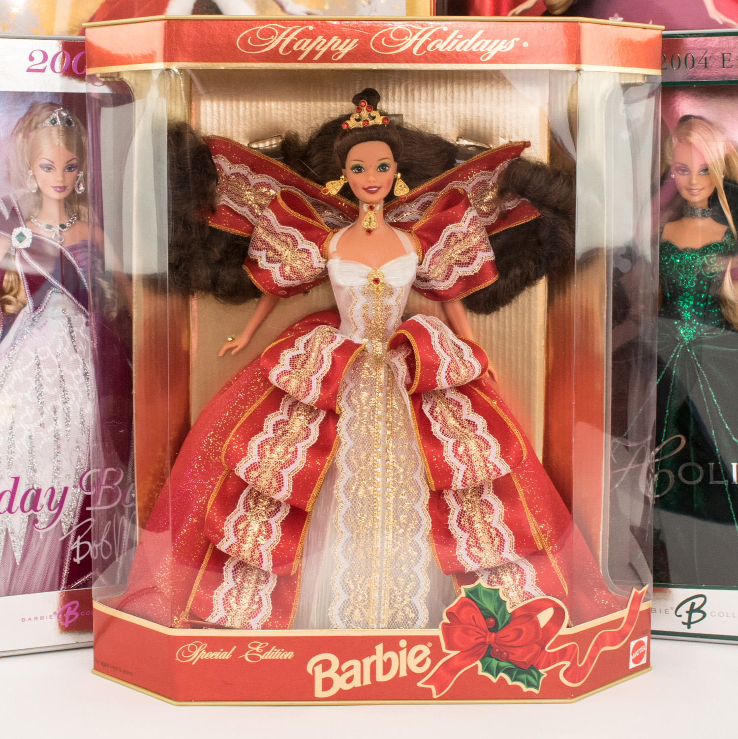 Five Collectible Holiday Barbies in Boxes