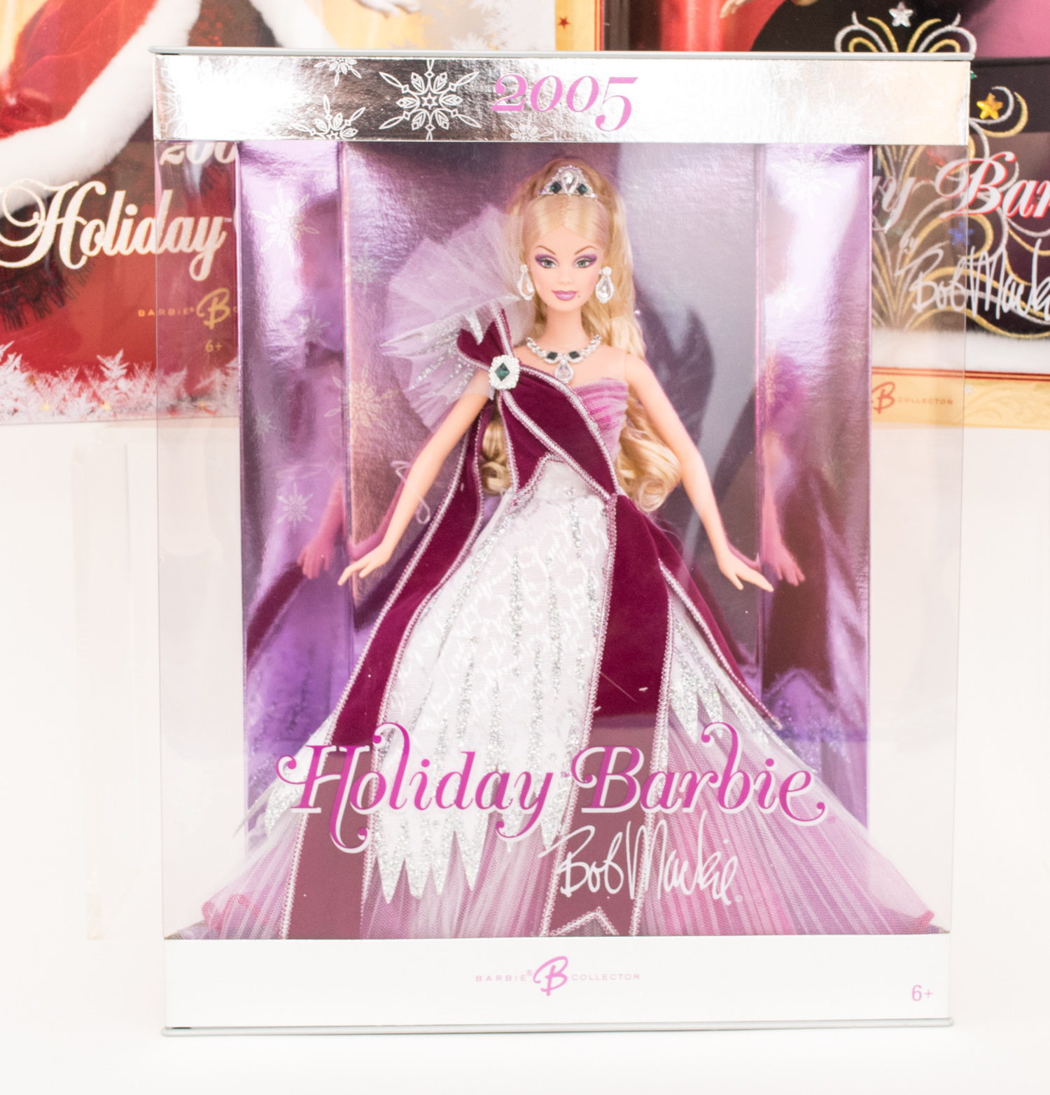 Five Collectible Holiday Barbies in Boxes