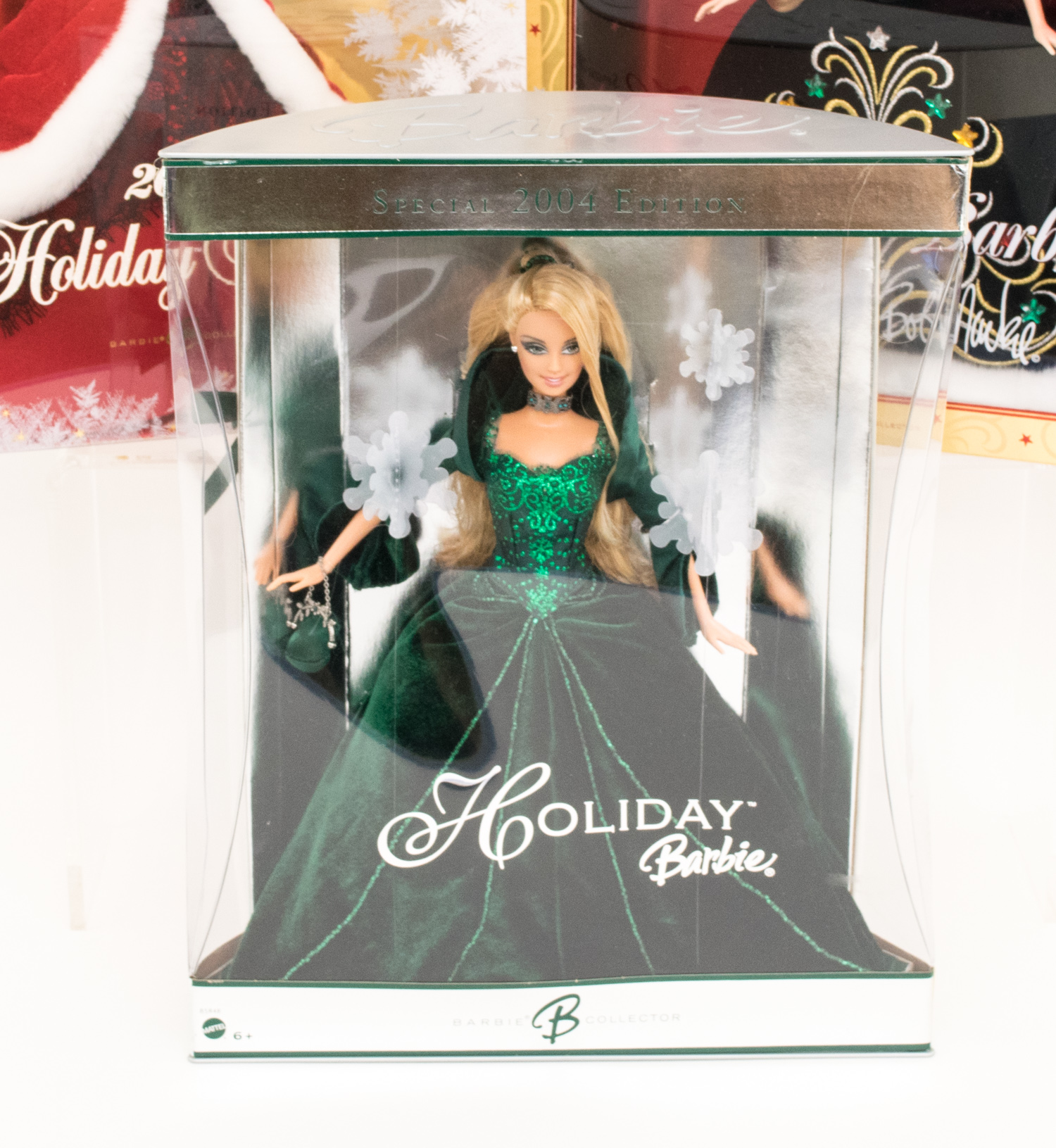 Five Collectible Holiday Barbies in Boxes
