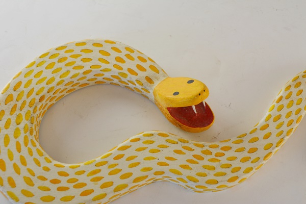 Wood Carved Child's Wall Mirror and Painted Snake