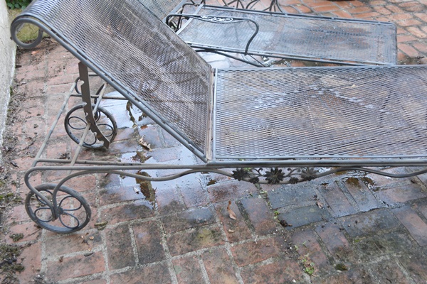 Two Black Metal Patio Chaise Lounge Chairs and Nesting Tables