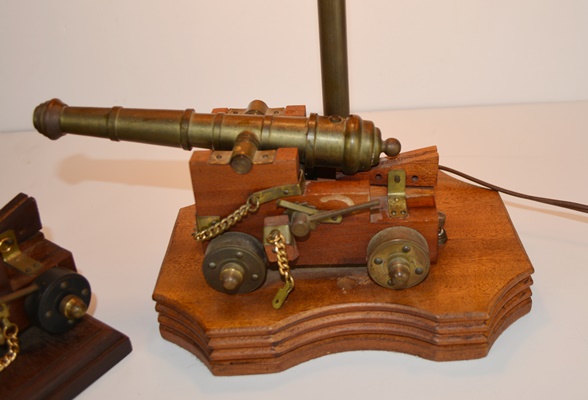 Pair of Canon Bookends and Matching Table Lamp