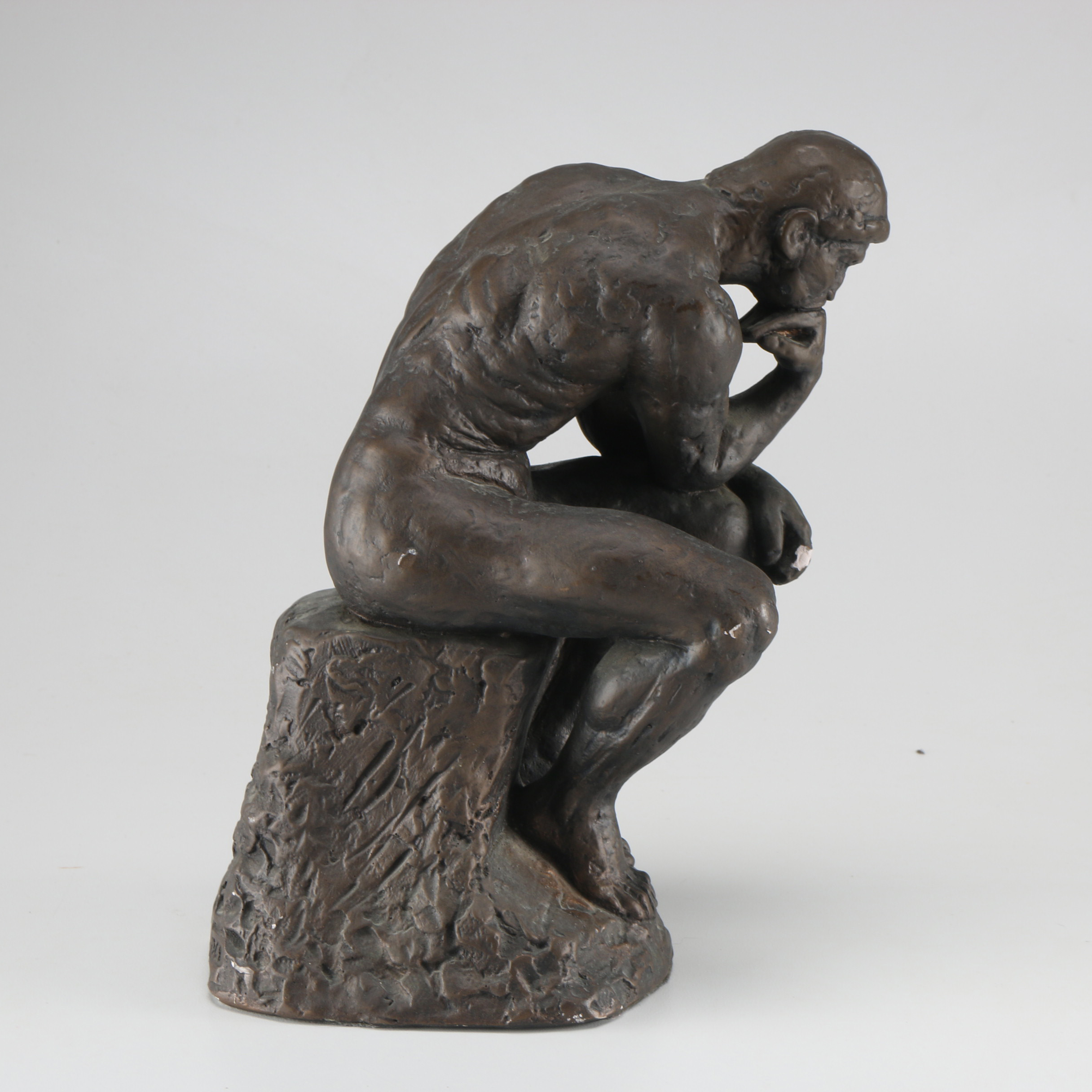 Miniature Reproduction of Rodin's "The Thinker" Sculpture