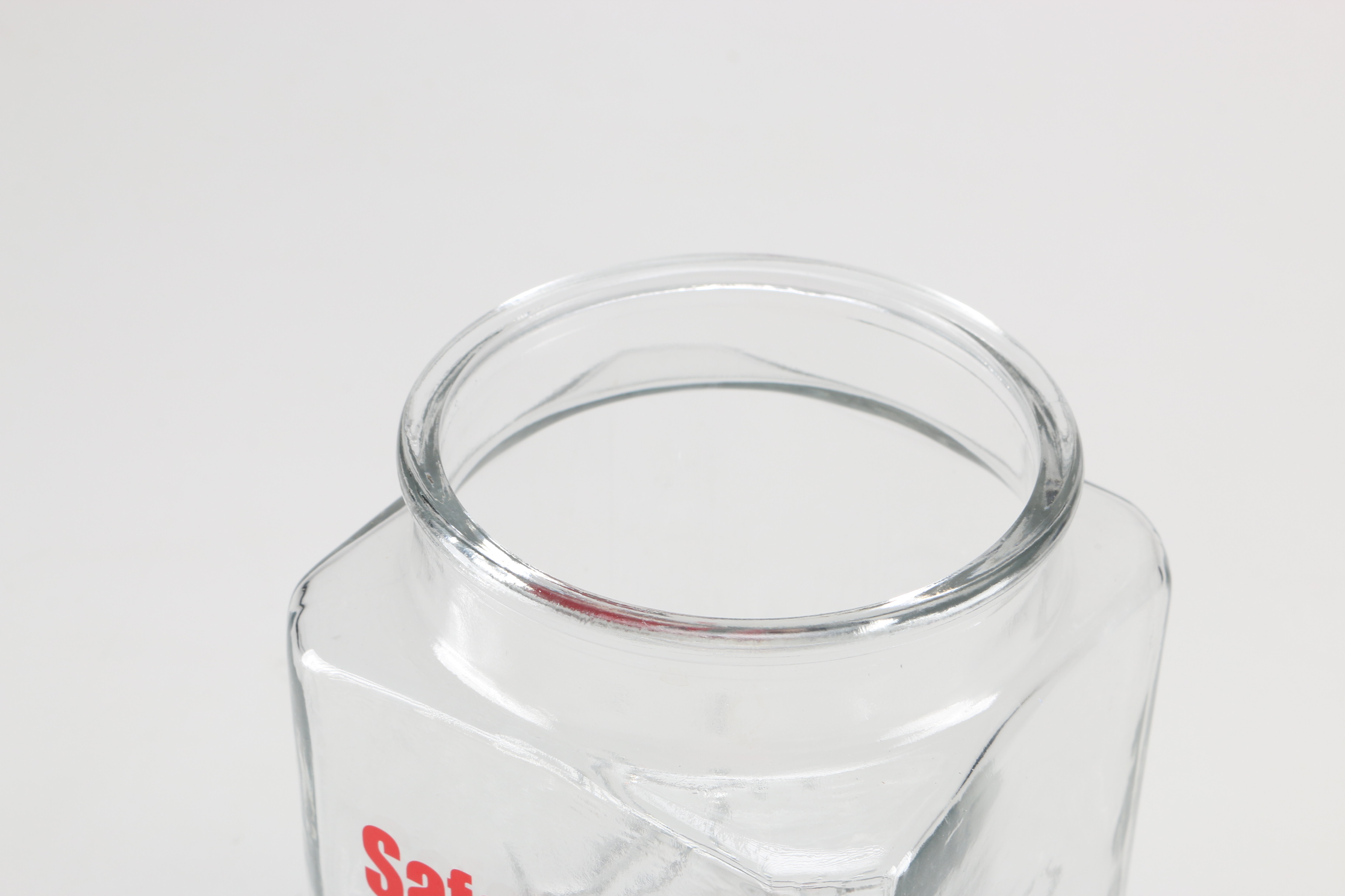 Assortment of Glass Items and Ceramic Pitcher