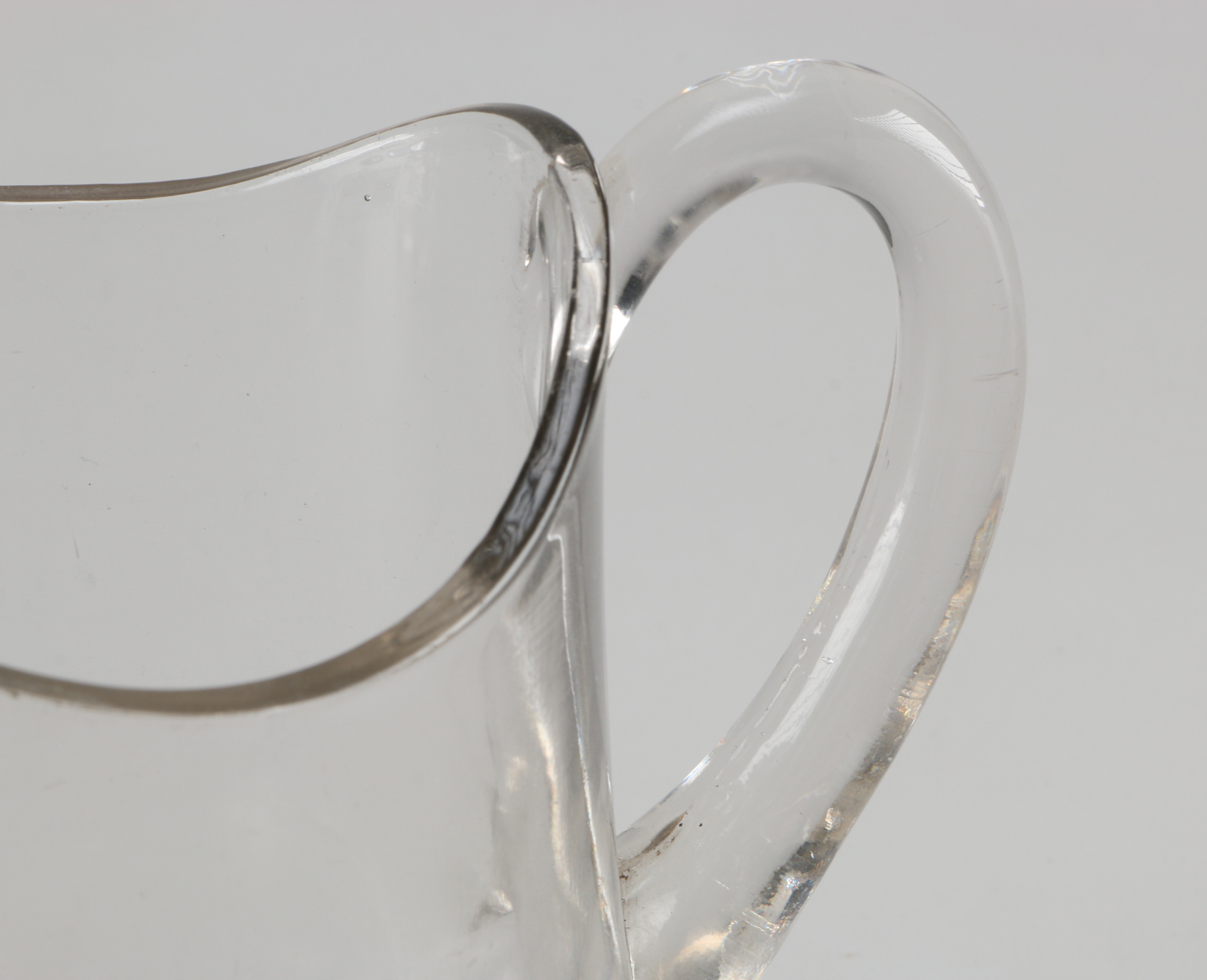 Assortment of Glass Items and Ceramic Pitcher